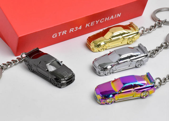 NISSAN SKYLINE GT-R R34 KEYCHAIN SET OF 4 1/87 SCALE DIECAST CAR MODEL BY SEEKER SEKCSET